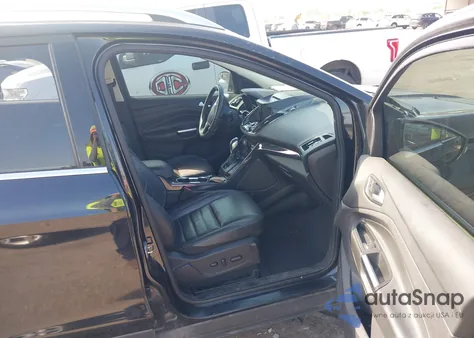 2015 Ford Escape Titanium z USA, uszkodzony, nr VIN 1FMCU0J99FUB93177